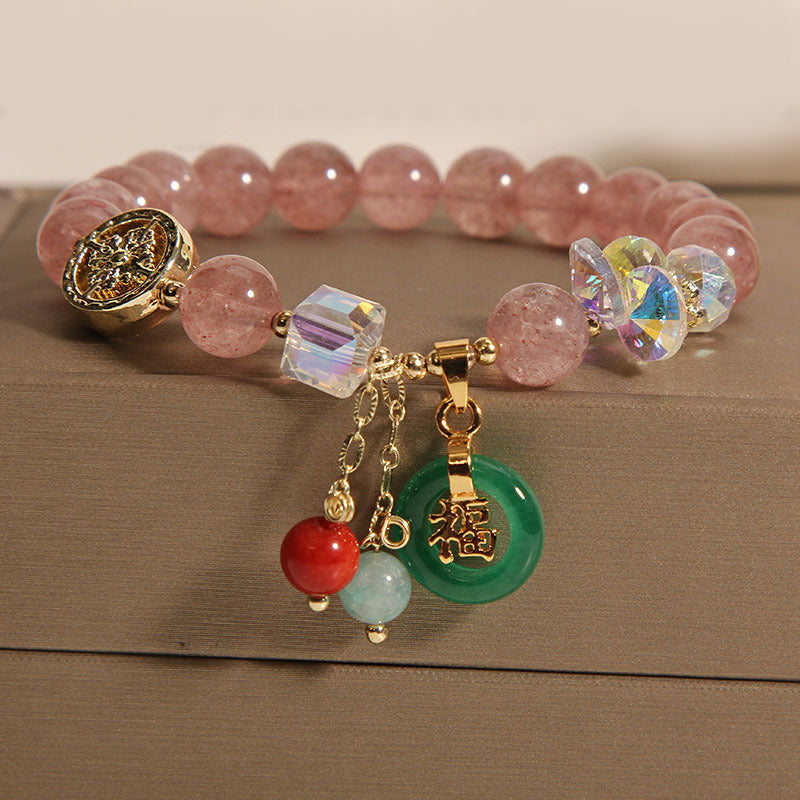 Armband Erdbeerquarz Jade Fu-Zeichen Heilstein goldene Perlen elegant.