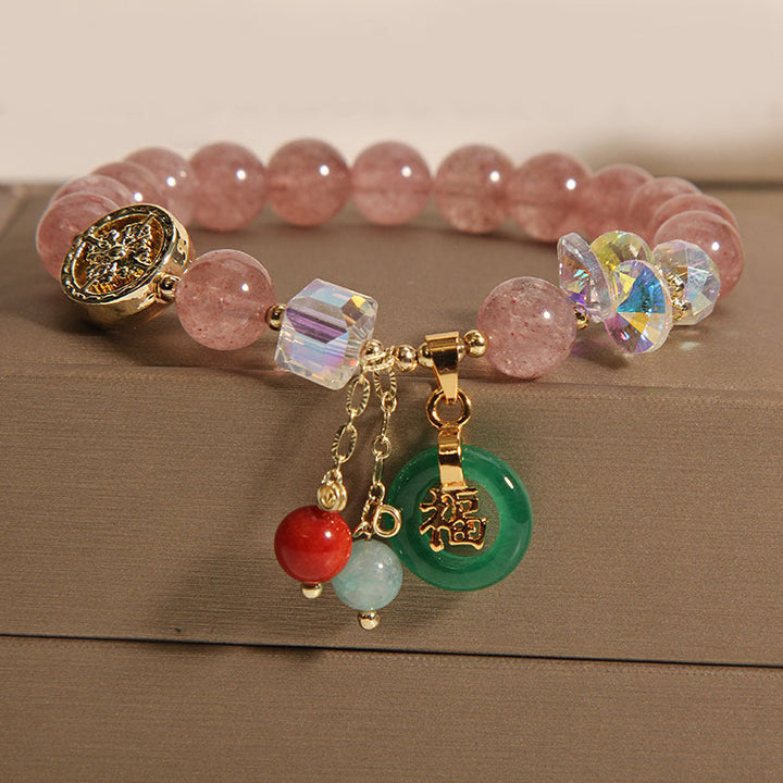 Armband Erdbeerquarz Jade Fu-Zeichen Heilstein goldene Perlen elegant.