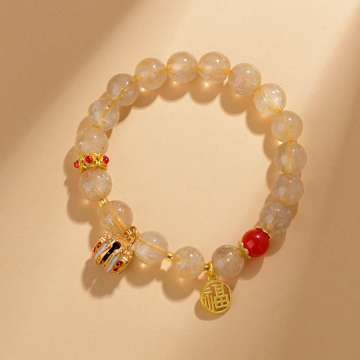 Armband Fu-Zeichen – Wohlstand mit Citrin und roten Perlen eleganz.