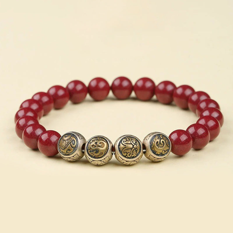 Rotes Zinnober Armband 925 Silber mit Segensperlen elegant getragen.