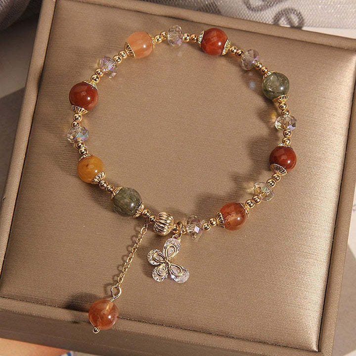 Armband Kristall Schmetterling – Wohlstand mit roten Steinen