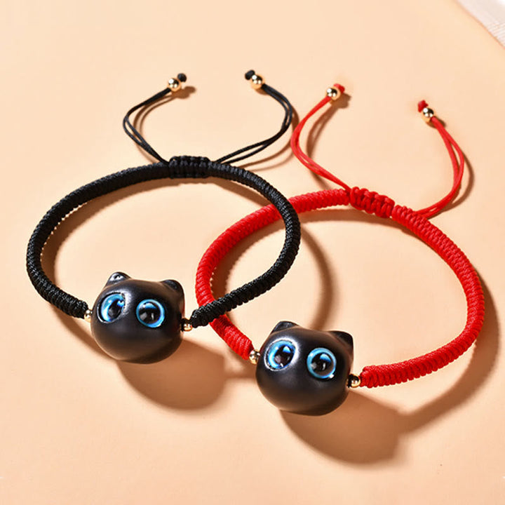 Armband Ebenholz Katze mit blauen Augen – elastisch verstellbar Frieden