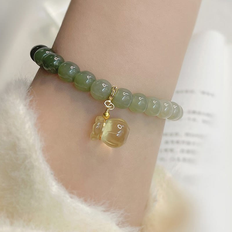 Jade Armband Wohlstand Balance grüne Perlen goldener Anhänger Handgelenk