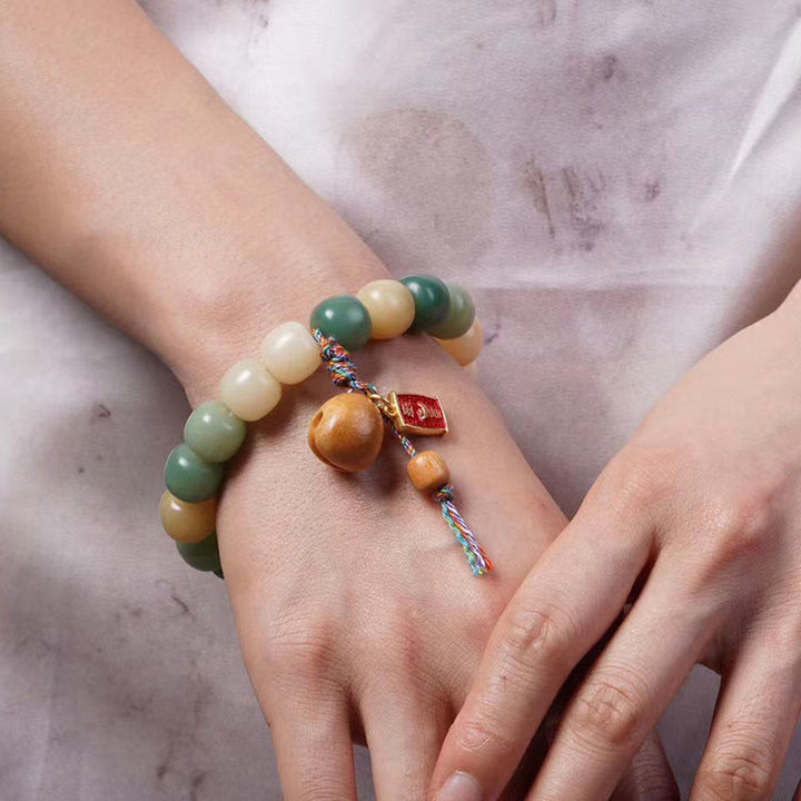 Armband Gradient Bodhi Samen Holzperlen Weisheit elastisch getragen