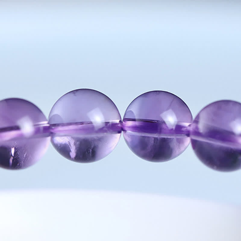 Armband Amethyst Kristall lila Perlen Schnur elastisch Naturstein
