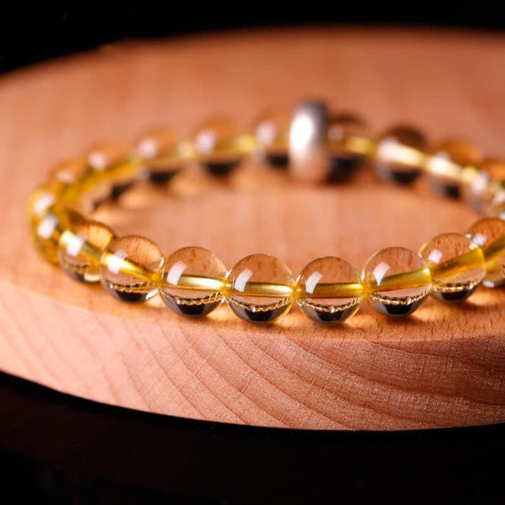 Citrin Armband Naturstein Perlen elastisch Handgelenk getragen glänzend