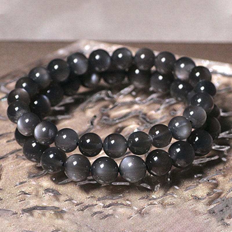 Mondstein Armband schwarze glänzende Perlen elastisch Naturstein Schmuck