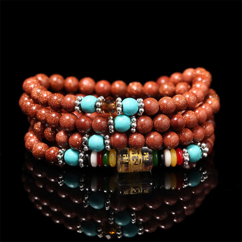 Rotes Armband Om Mani Padme Hum mit türkisen Perlen Balance
