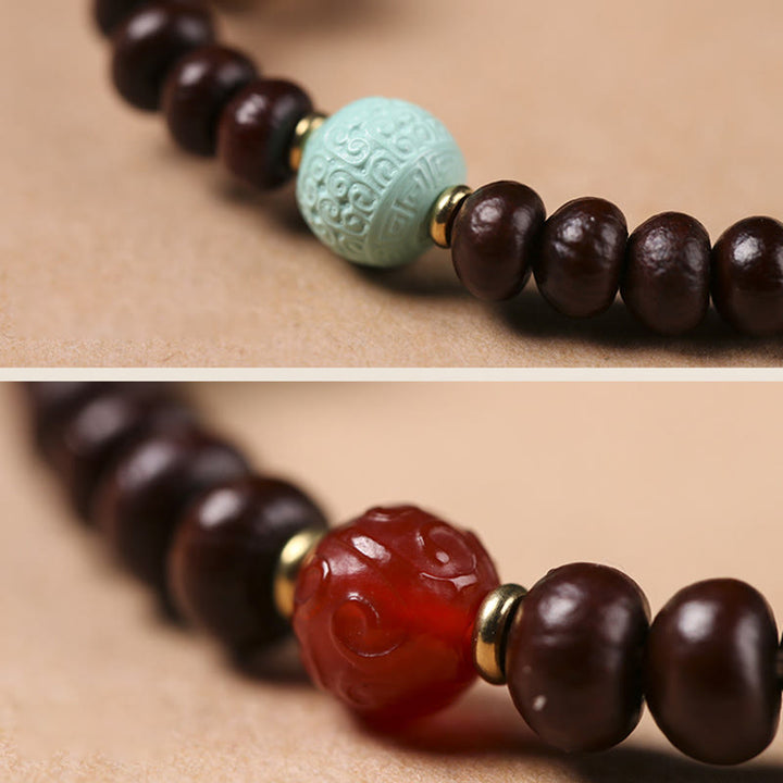 Bodhi Armband mit braunen Perlen und Jade Mittelteil Naturstein.