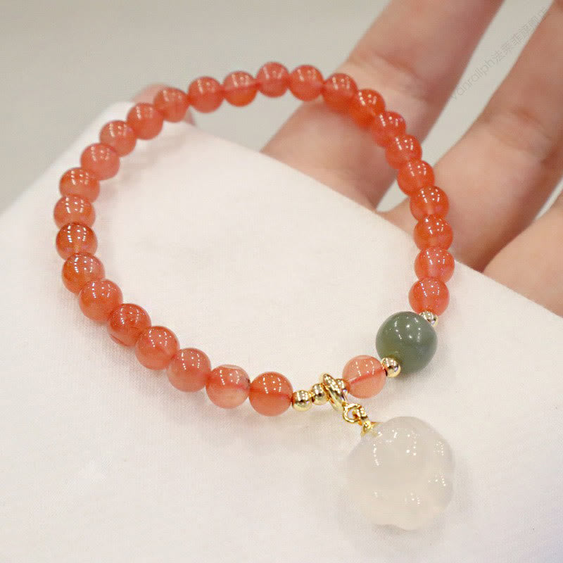 Armband Roter Achat Jade Katze elastisch Naturstein glänzend Handgelenk getragen