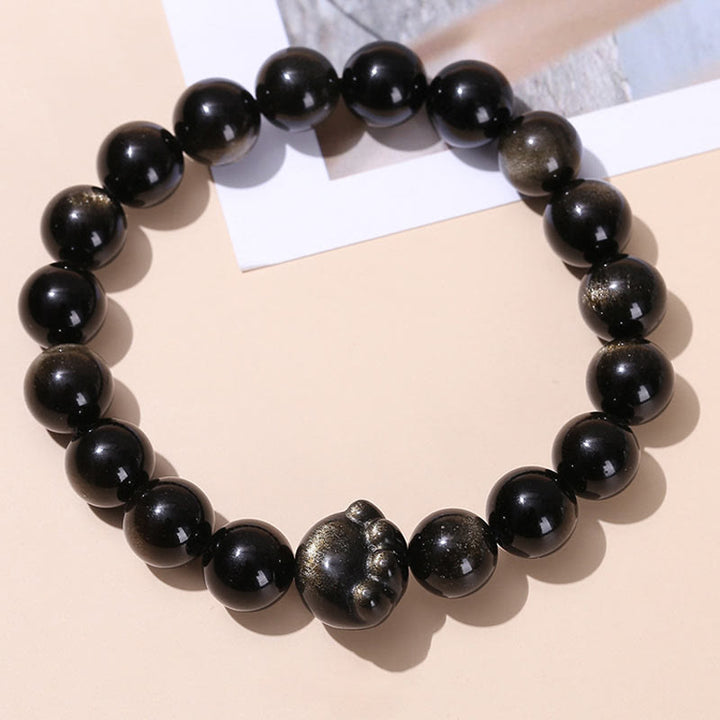 Schwarzes Obsidian Armband Silber Katze Wohlstand elastisch getragen