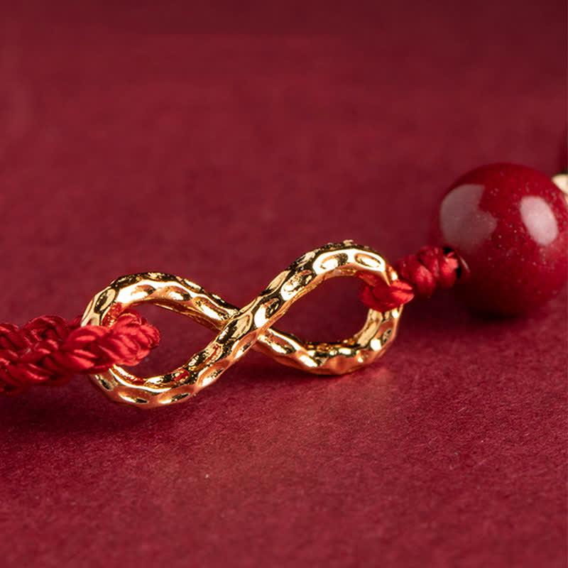 Armband Rotes Band Gold Infinity Symbol