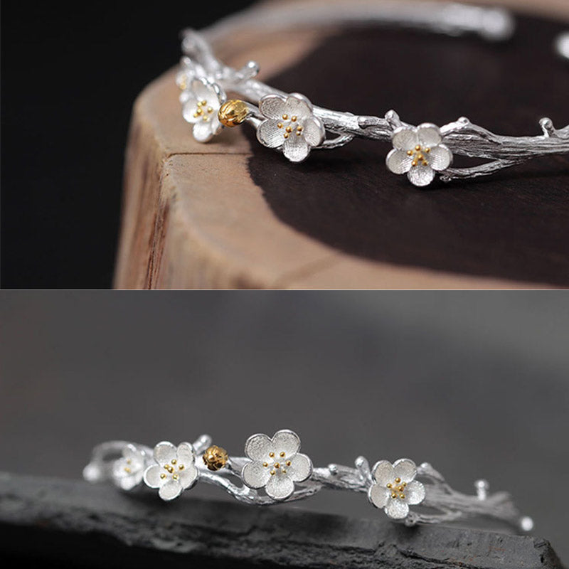 Silbernes Blüten-Armband 925er Silber mit goldenen Staubgefäßen elegant.
