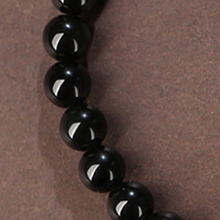 Armband Schwarzer Obsidian Jade – Stärke & Glück mit glänzenden Kugeln elastisch