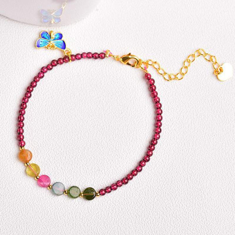 Armband Granat Schmetterling – Schutz mit bunten Perlen und Schmetterlingsanhänger