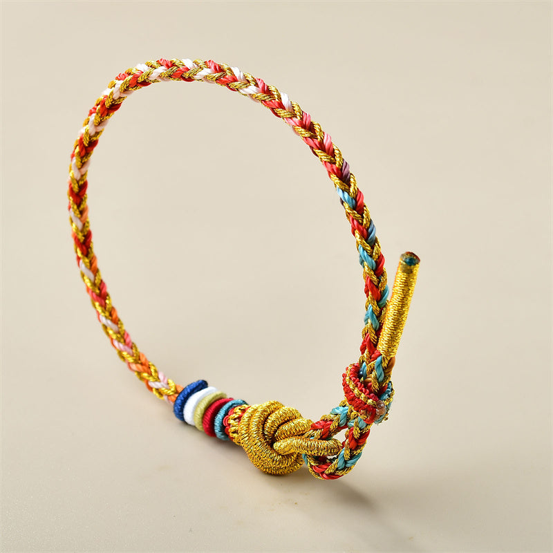 Geflochtenes Armband Gold – Heilung bunten Farben elastisch tragbar.