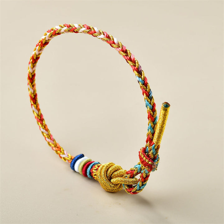 Geflochtenes Armband Gold – Heilung bunten Farben elastisch tragbar.