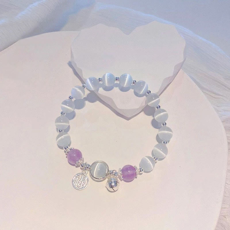 Armband Amethyst Fu-Zeichen weiße Perlen lila Stein elegant