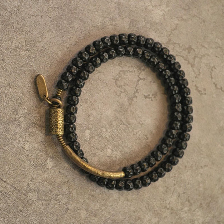 Schwarzes Kokos-Armband mit goldenem Verschluss, elastisch, Retro-Design Glück.