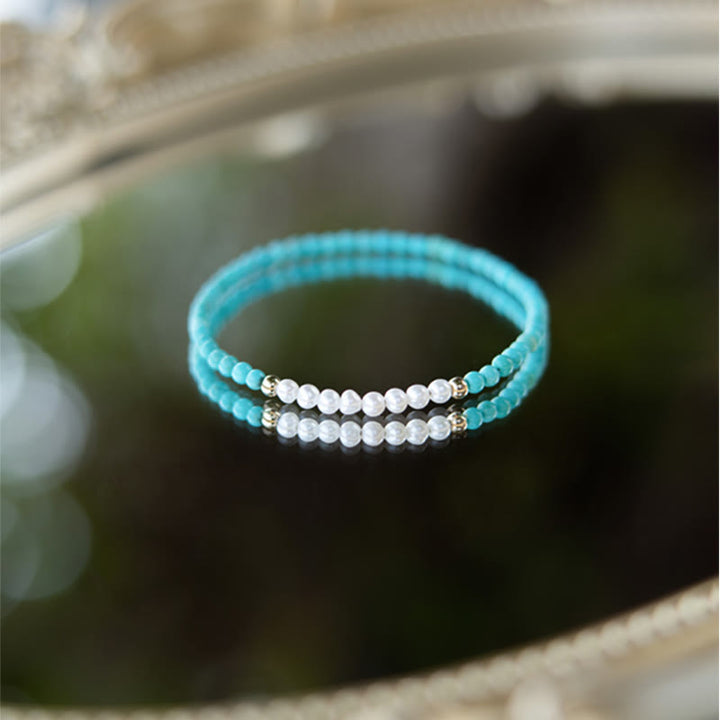 Armband 925 Silber Türkis Perlen Weiß elastisch Handgelenk getragen