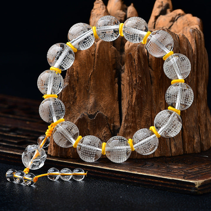 Armband Weißer Kristall Herzsutra elastisch Holz Hintergrund Gelb Perlen