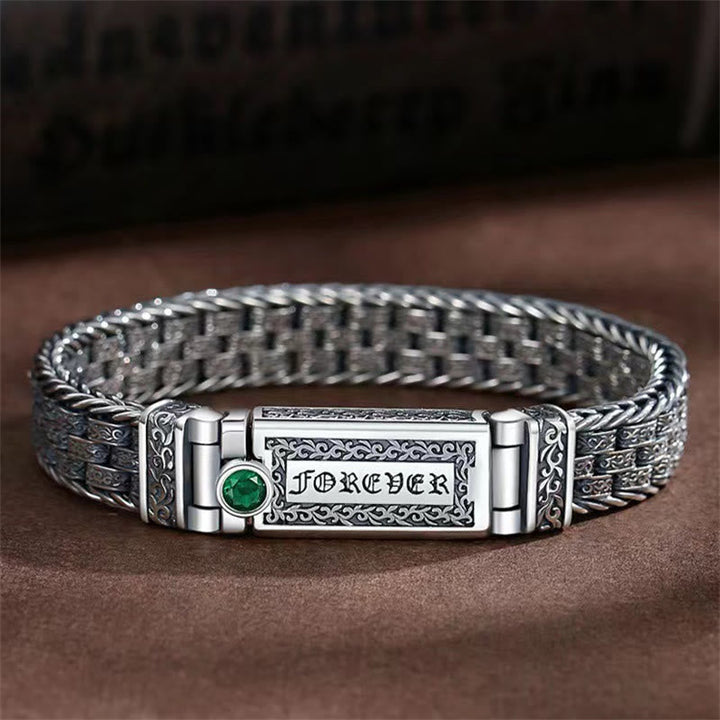 Silbernes Armband mit "Forever" Gravur und grünem Stein elegantes Design.