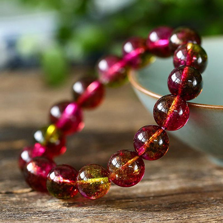 Tourmaline Armband Liebe Weisheit mit roten glänzenden Perlen Nahaufnahme