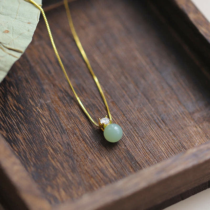 Anhänger Jade Perle Wohlstand Glück grüner Naturstein Goldkette elegant