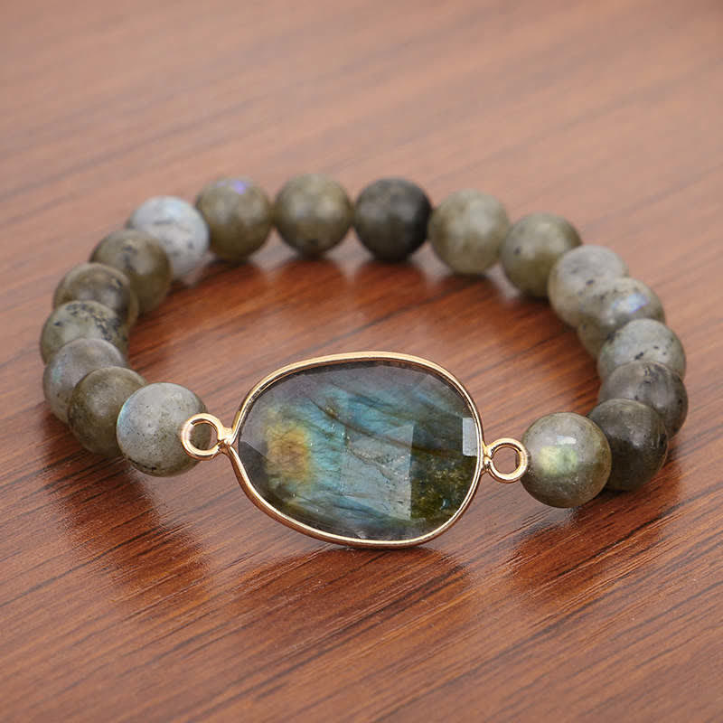 Armband Labradorit Mondstein auf Holz, graugrüne Perlen, Silberfassung glänzend