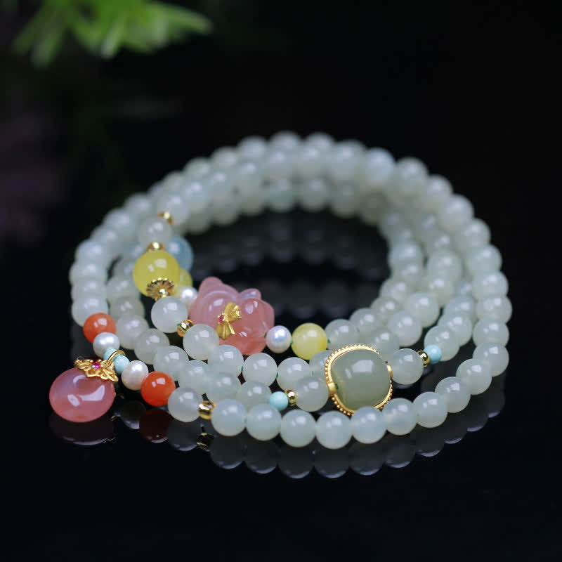Armband Kristall Jade – Frieden & Glück mit weißen Perlen und farbigen Anhängern