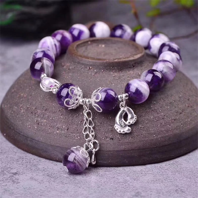Amethyst Armband 925 Silber lila Perlen Naturstein elegant getragen