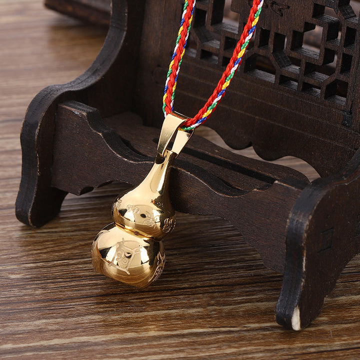Goldene Kürbis Anhänger Kette bunte Kordel Tibet Harmonie