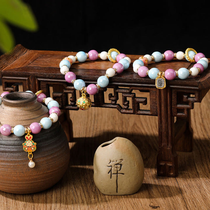 Armband – Schutz & Wohlstand & Energie mit Perlen und Goldverzierungen elegant.