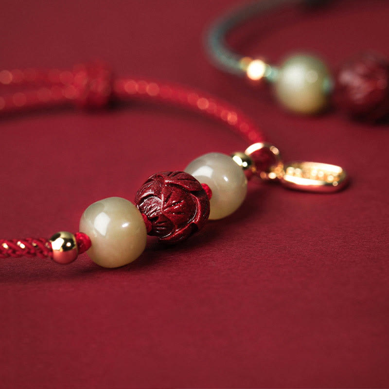 Armband Zinnober Jade Lotus – Glück mit Perlen elegant rot.