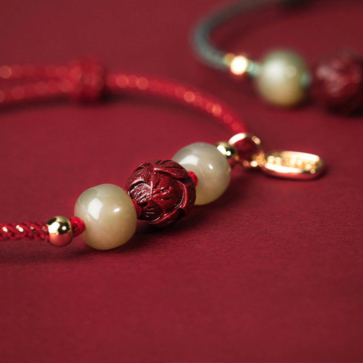 Armband Zinnober Jade Lotus – Glück mit Perlen elegant rot.