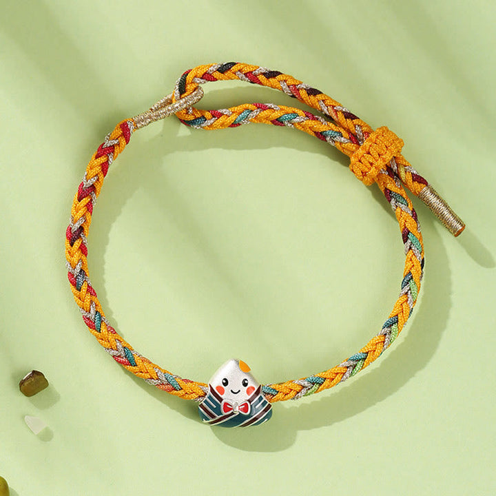 Buntes Seil-Armband mit niedlichem Daruma-Puppe-Anhänger Glücksbringer