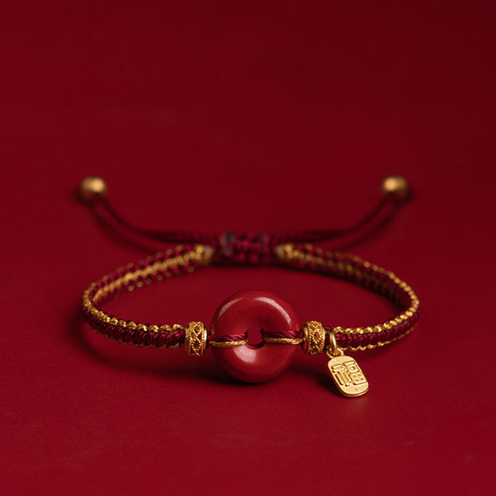 Armband Zinnober Fu-Zeichen rotes Perlenarmband goldene Akzente elegant