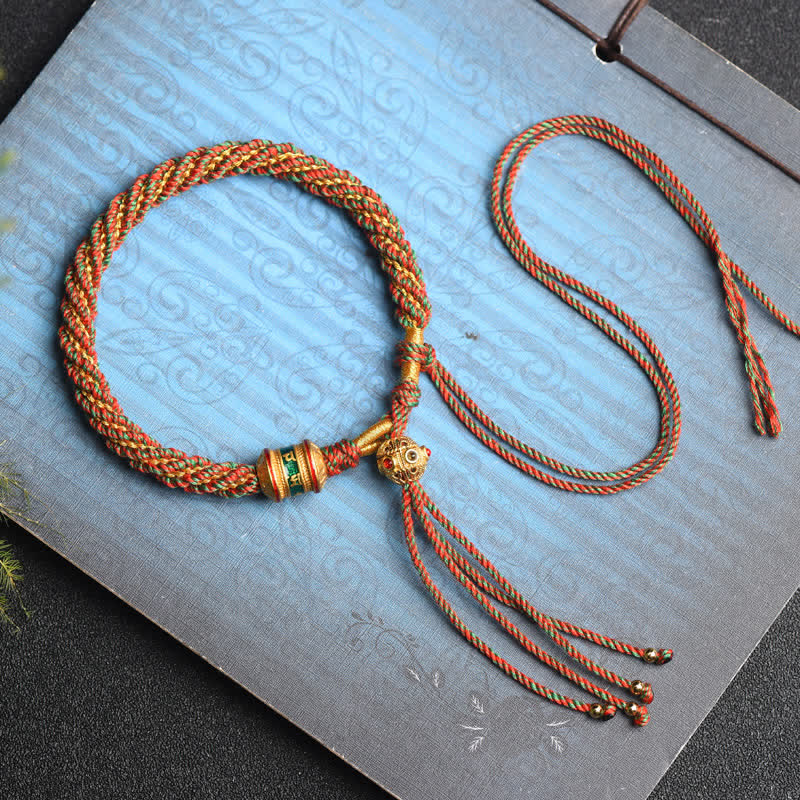 Tibetisches Gebetrad Armband orange Seil Perlen Glück Schutz Spiritualität