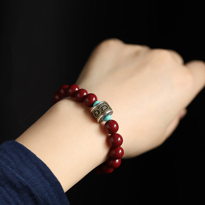 Rotes Armband mit 925 Silber Om Mani Padme Hum Anhänger elegantes Design