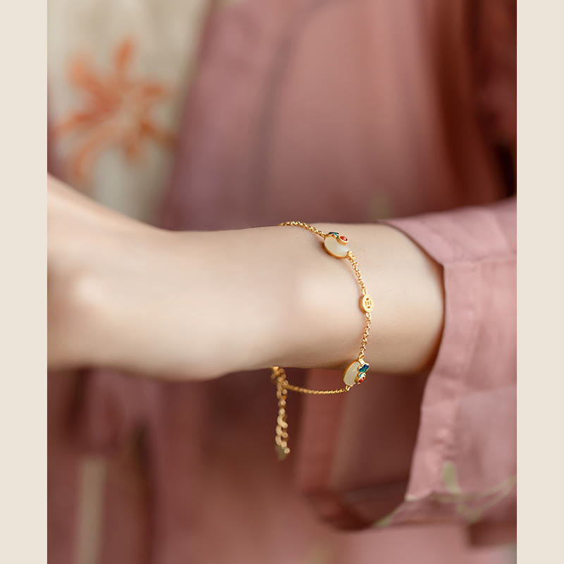 Armband Jade Glückswolken – Glück goldfarben Perlen elegant Handgelenk getragen