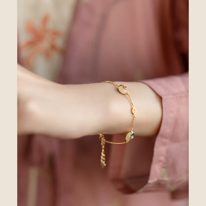 Armband Jade Glückswolken – Glück goldfarben Perlen elegant Handgelenk getragen
