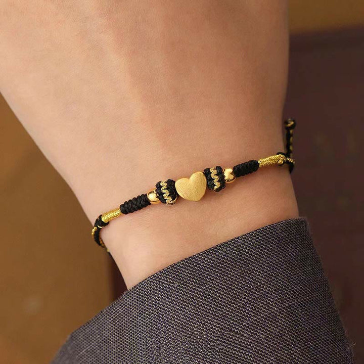Armband – Glück & Liebe & Energie mit Herzstein schwarz gold geflochten