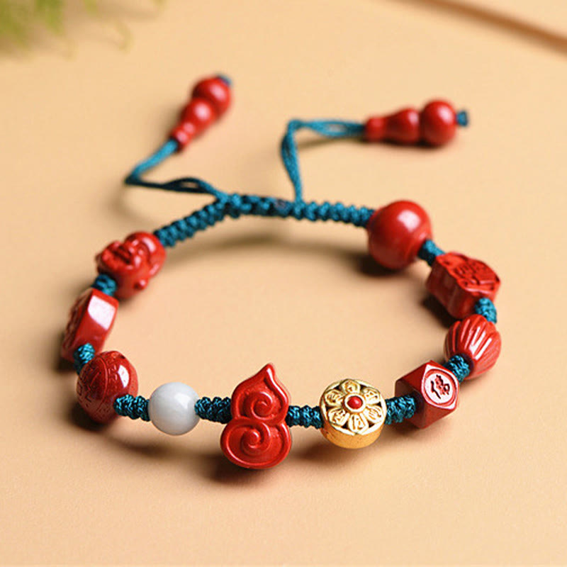 Rotes Zinnober Armband mit Om Mani Padme Hum Perlen blauem Band