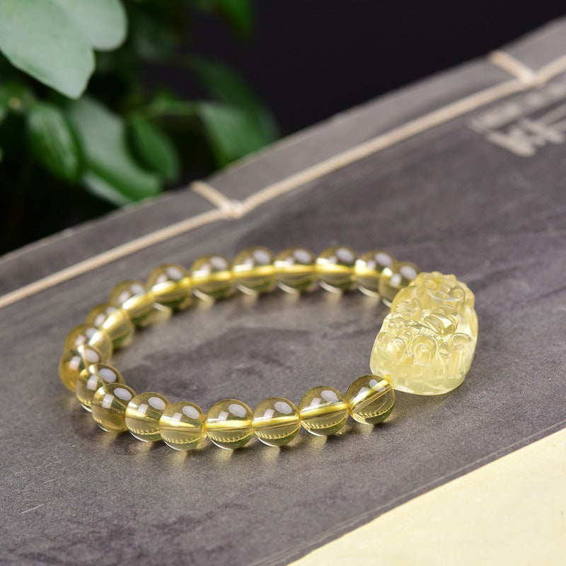 Armband Citrin Pixiu Wohlstand goldgelb glänzend Naturstein Perlen elastisch