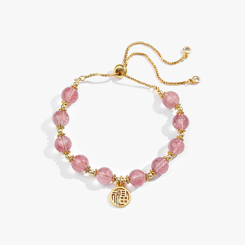Armband Erdbeerquarz Fu-Zeichen – Energie goldfarben elastisch Naturstein