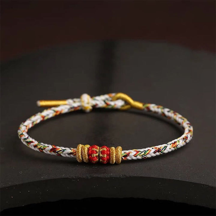 Armband Bunt Geflochten Knoten – Glück mit goldenen Perlen elegant