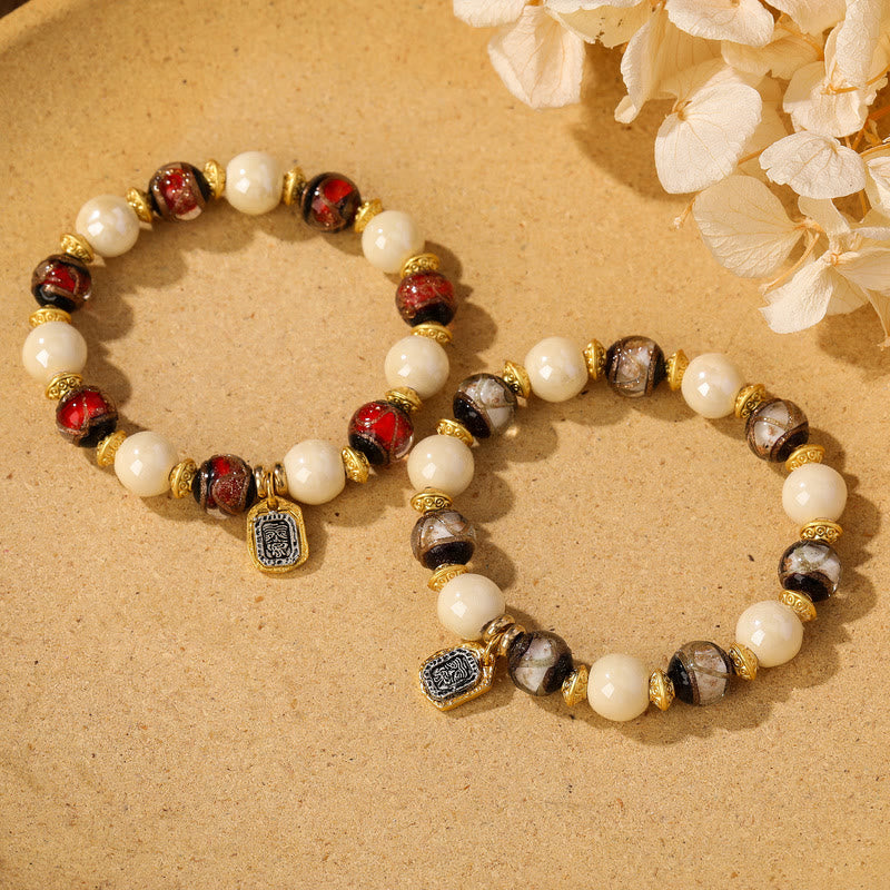 Armband – Schutz & Wohlstand & Balance weiße Perlen rote schwarze Beads Gold