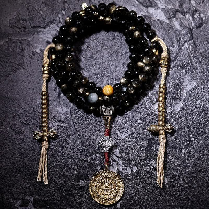 Mala Tigerauge Obsidian Armband mit goldenen Perlen und Anhängern.