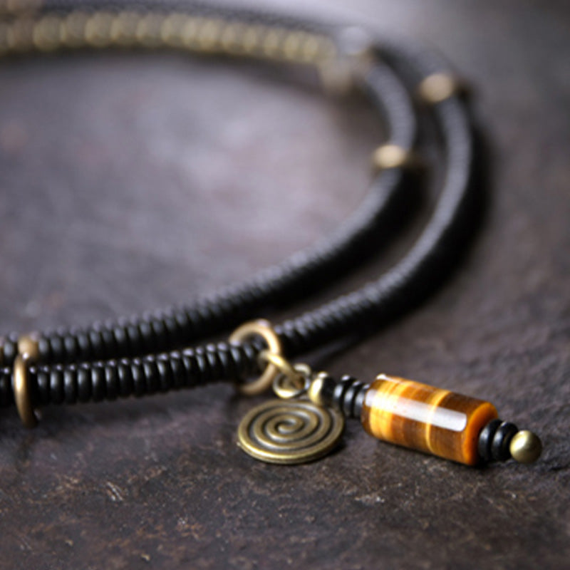 Armband Kupfer Ebenholz Paar Frieden mit Spiralanhänger elegant.