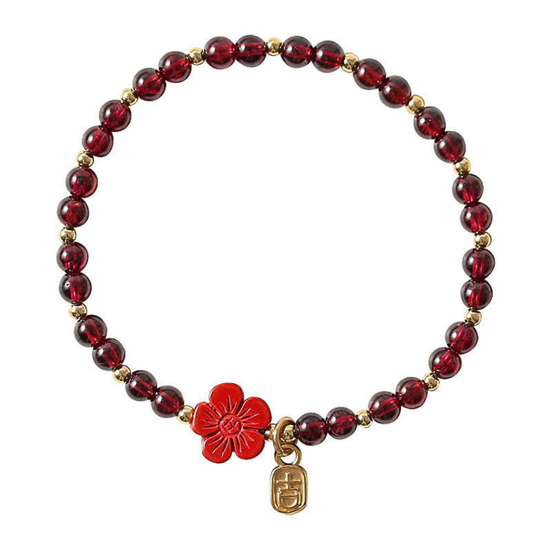 Armband 14k Gold Granat Zinnober Blume rotes Perlenarmband flach gelegt